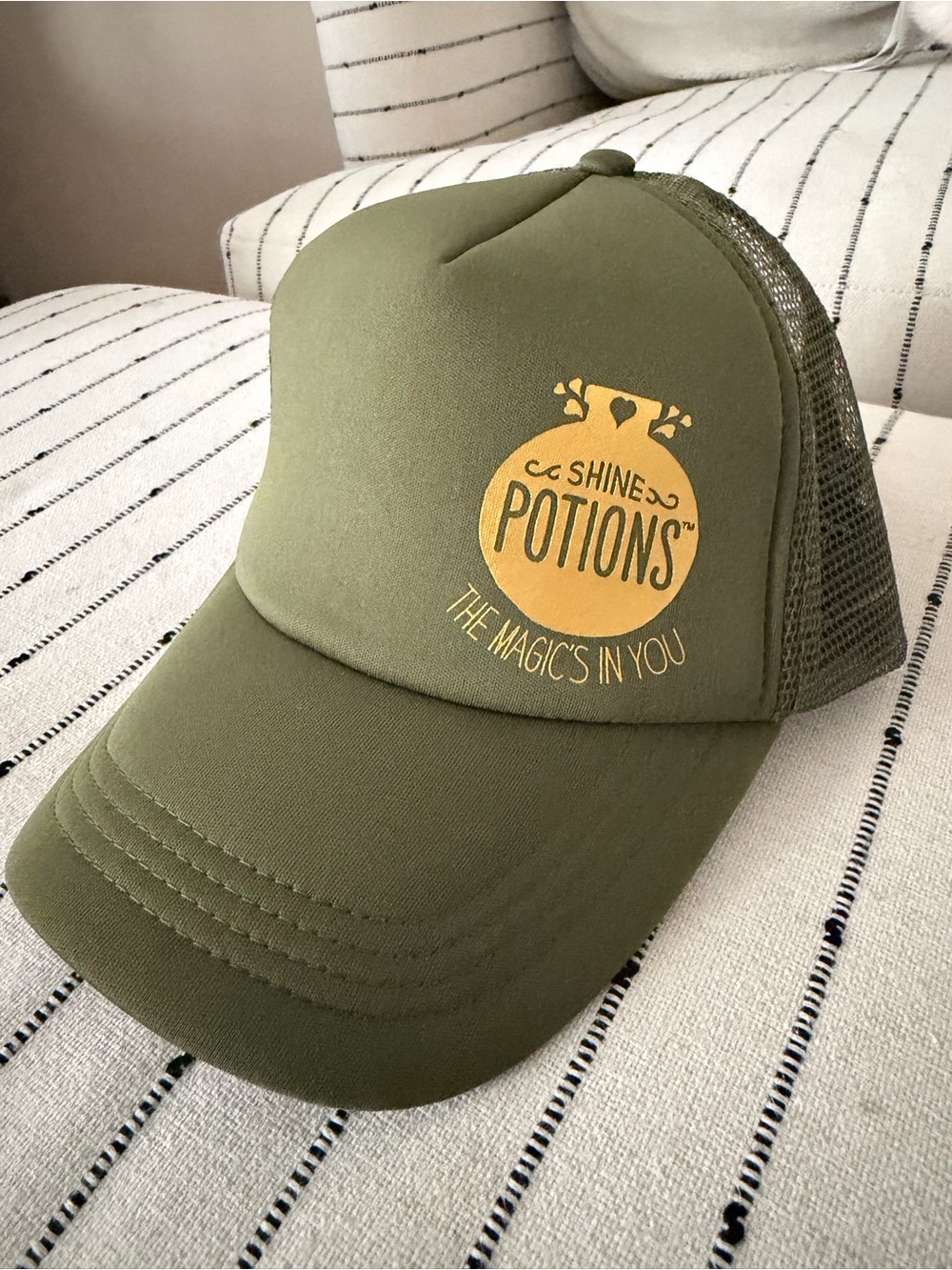 Shine Potions Boulder CO Olive Green Trucker Hat with Gold Logo